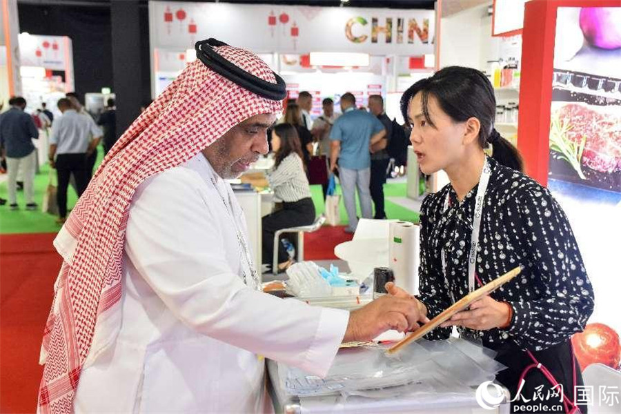 參展商交流。人民網(wǎng)塔里克·易卜拉欣攝