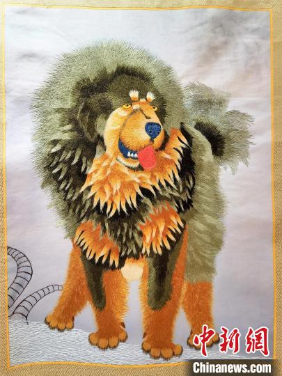 圖為藏繡作品?！∑钤鲚?攝